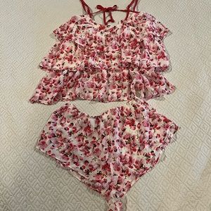 Lingerie Ruffle layers, cut out back with cheeky shorts to match.